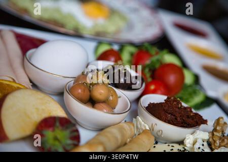 Delicious Turkish Breakfast Spread With Fresh Vegetables And Assorted Sides. Stock Photo