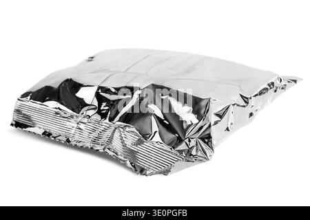Silver foil paper packet lying on white background Stock Photo