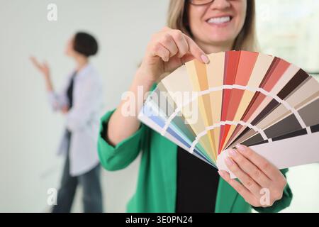 Creative color selection sparks inspiration in a bright design studio with lively discussions Stock Photo