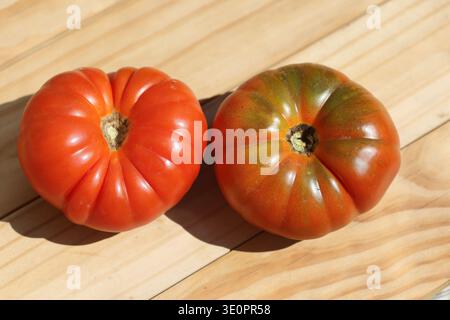 top view of Pantano Romanesco tomato on wooden background Stock Photo