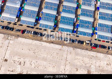 Overhead view of the marywilska 44 shopping center in warsaw, showing rooftops, parked cars, and market stalls, Warsaw, Masovian Voivodeship, Poland. Stock Photo