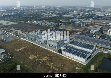 aerial view of a modern data center complex featuring server buildings and solar panels, reflecting high tech infrastructure and sustainable energy in Stock Photo