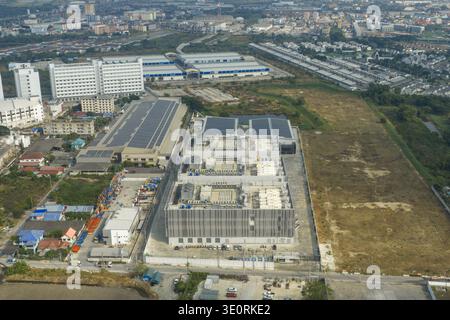 aerial view of discovering a large ai data center complex in bang sao thong, samut prakan, thailand, integrating renewable energy infrastructure Stock Photo