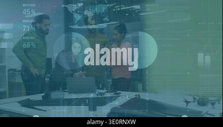 Working 5-person team in jackets sweaters assembling drone around laptop in workshop with HUD map Stock Photo