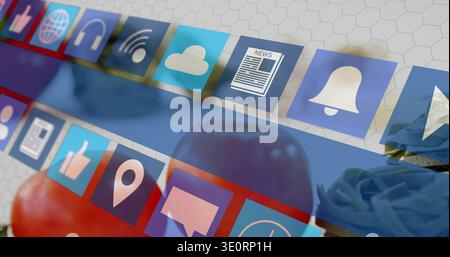 Floating app icon tiles crossing white hex tiles, showing red apple and blue fabric Stock Photo