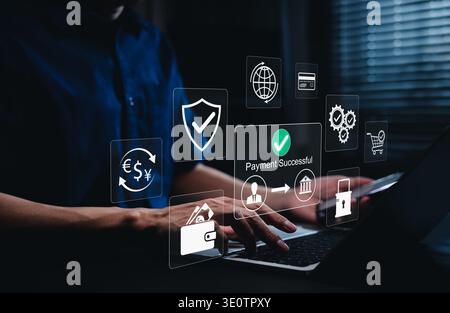 Secure online payment concept. Person using laptop and virtual financial icons showing payment confirmation, digital wallet, banking transaction, cybe Stock Photo