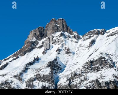 Snow covered peak at San Domenico, Italian Alps, jagged spires Stock Photo