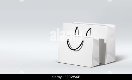 Two white paper shopping bags with black handles on light grey gradient background. Concept of seasonal shopping, online purchase, retail sale and min Stock Photo