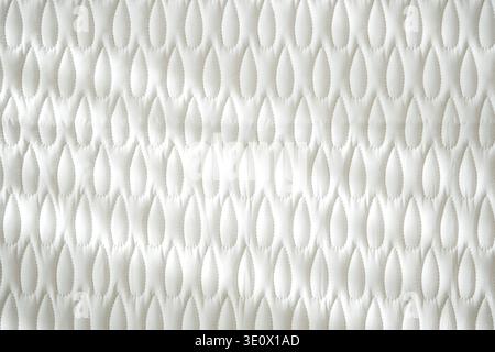 Textured fabric pattern in white color on a flat surface Stock Photo