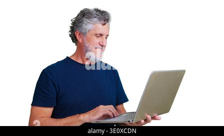 Senior man smiling using laptop, transparent background Stock Photo