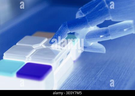 Robot hand pressing button, concept of artificial intelligence . Stock Photo
