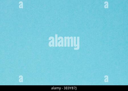 Blue paper textured background with subtle gradient for modern design projects Stock Photo