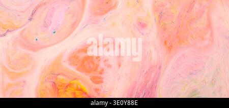 Soft pastel abstract swirl pattern with pink yellow and cream colors for background Stock Photo