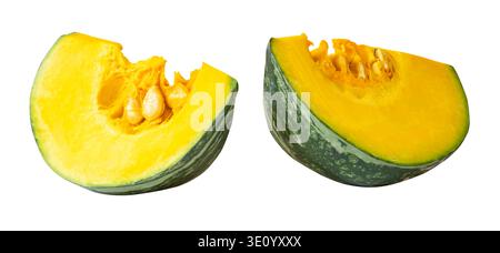 Green Japanese pumpkin fruit in two quarters or slices in set is isolated on white background with clipping path. Stock Photo