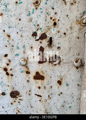 Bright rust stains texture paint showing through to rust underneath Stock Photo