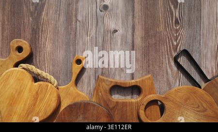 Empty cutting boards on wooden background Stock Photo