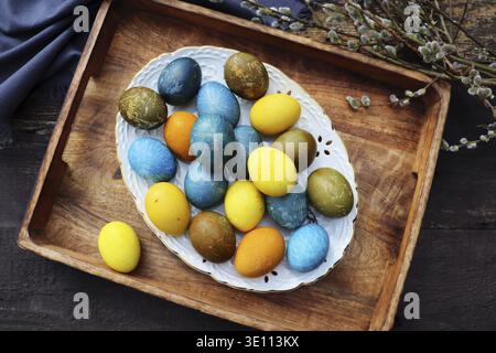 Stylish Easter table setting. Natural egg, modern plate. Easter table decoration Stock Photo