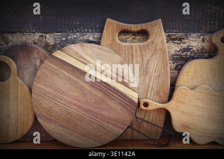 Empty cutting boards on wooden background Stock Photo