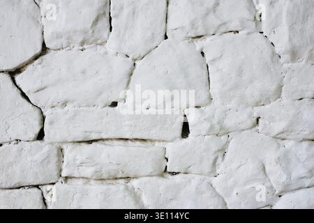 Stone wall. Old chalk stone pattern background. Natural background and wallpaper. Stone texture Stock Photo