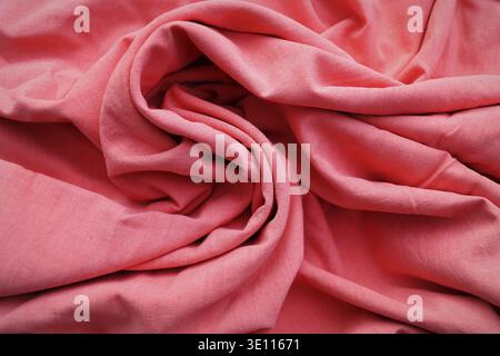 Rose gold fabric cloth texture for background and design art work, beautiful crumpled pattern of pink cotton Stock Photo