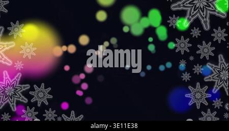 Glowing colorful bokeh orbs forming horizontal trail on dark wallpaper, showing white star outlines Stock Photo