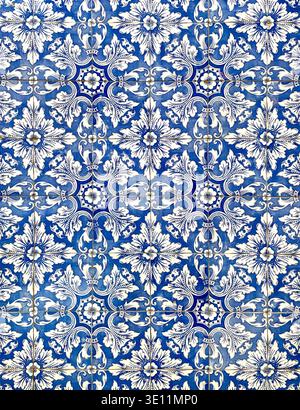 Traditional blue Portuguese azulejo tiles with geometric pattern, vintage ceramic wall decoration Portugal Stock Photo