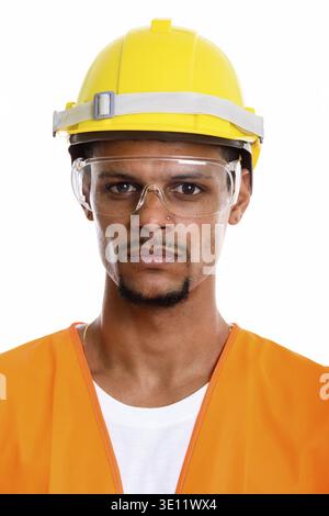 Face of young African man construction worker wearing protective glasses Stock Photo