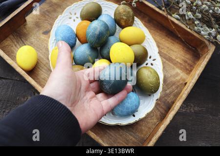 Stylish Easter table setting. Natural egg, modern plate. Easter table decoration Stock Photo