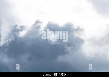 Soft cloudy sky with light overcast clouds and subtle blue tones Stock Photo