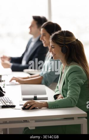 Professional staff of tech support working in call center office Stock Photo