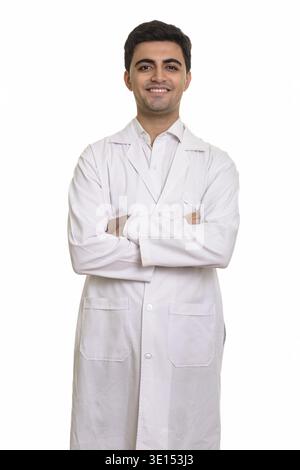 Young happy Persian man doctor isolated against white background Stock Photo