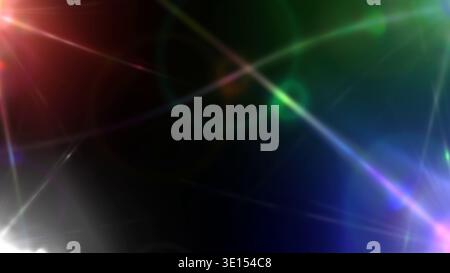 Intersecting rainbow light rays and lens flares creating an energetic dark background Stock Photo