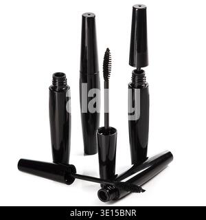 Mascara brushes and containers on white background Stock Photo
