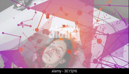 Reclining adult woman in white round bathtub, rose petals, candle holder and pink-purple overlaying Stock Photo