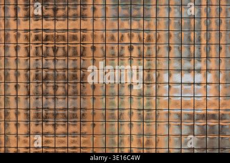 Textured wired glass surface creating abstract pattern with light and shadow reflections Stock Photo