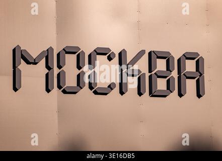 Moscow written in segment digital font, Cyrillic typography on a modern wall Stock Photo