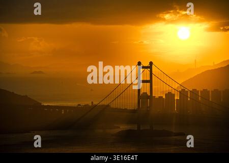 Sunset View of Tsing Ma Bridge in Hong Kong Stock Photo