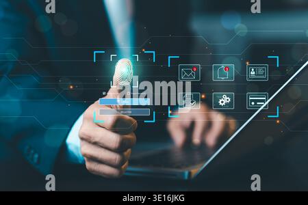Businessman using fingerprint scanning for biometric login on virtual screen, cyber security and digital identity authentication technology. Stock Photo
