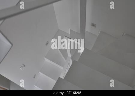 Abstract white stair composition with sharp geometric lines. Stock Photo