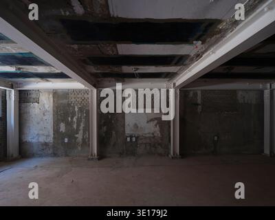 Raw unfinished concrete interior under construction. Stock Photo