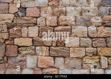 Texture of an old brick wall at the Cistercian Abbey of Fontfroide in France Stock Photo