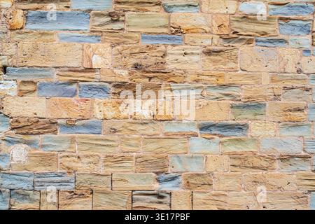 Texture of an old brick wall at the Cistercian Abbey of Fontfroide in France Stock Photo