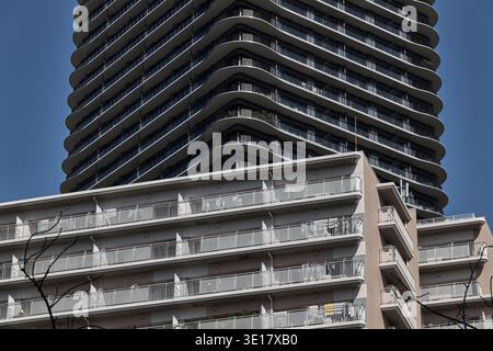 Apartment facade with repeating balconies and stacked floor plates. Stock Photo