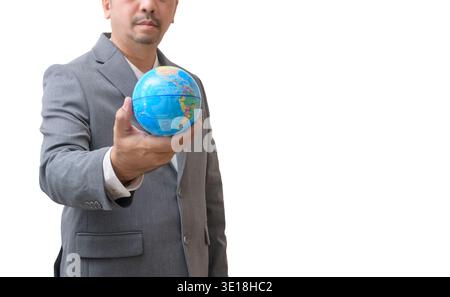 A businessman holding a small globe in his hand against a light background with copy space. The image represents global responsibility, sustainability Stock Photo