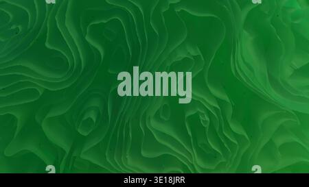 Green abstract fluid wavy contour lines background texture creating organic layers Stock Photo