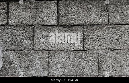Gray concrete blocks wall pattern industrial background Stock Photo