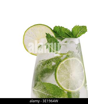 Glass of mojito with ice cubes, lime slices and fresh mint leaves is making you thirsty Stock Photo