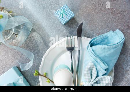 Holiday Table Setting with Budding Branch and Plate Stock Photo