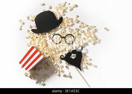 Popcorn bucket and photo booth prop for movie party on white background Stock Photo