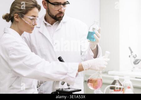 Two students are working in a laboratory during science research work Stock Photo